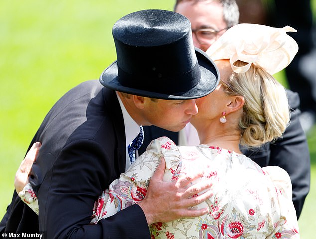 The Prince of Wales, 41, was seen warmly hugging Princess Anne's daughter, 43, during the second day of racing in Berkshire.