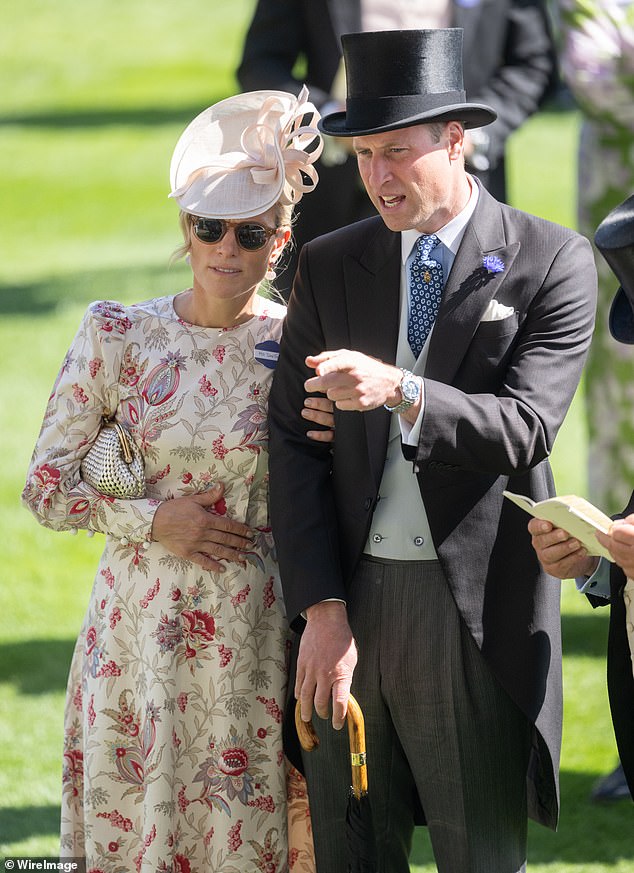 Zara looked sophisticated in an elegant pink floral dress which she paired with a cream trilby hat and delicate cream earrings.