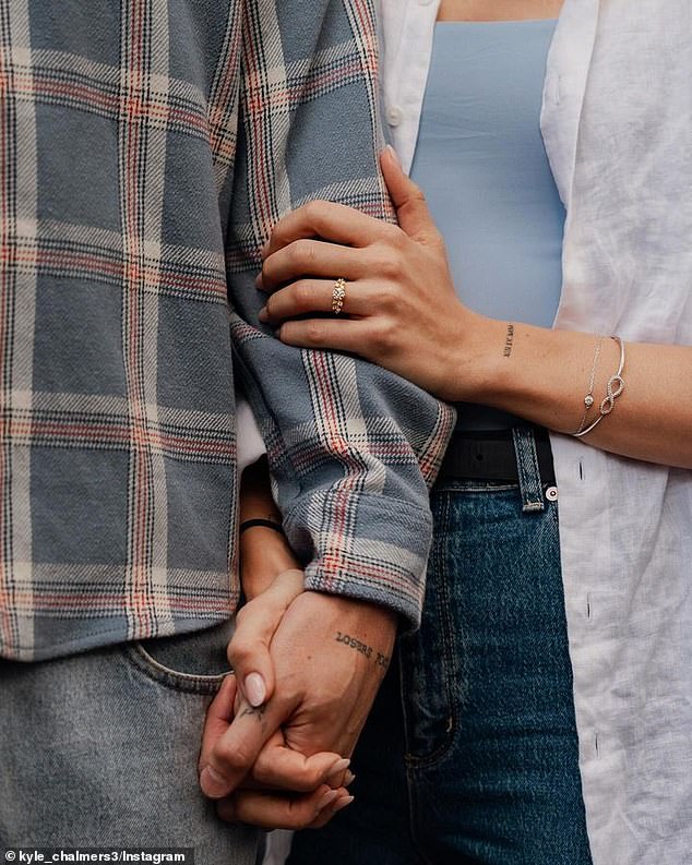 A second frame shows the couple's hands intertwined as they both show off what appear to be matching tattoos.