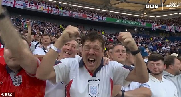 Viral England fan Milne (centre) was spotted again during England's Euro 2024 opener against Serbia on Sunday.