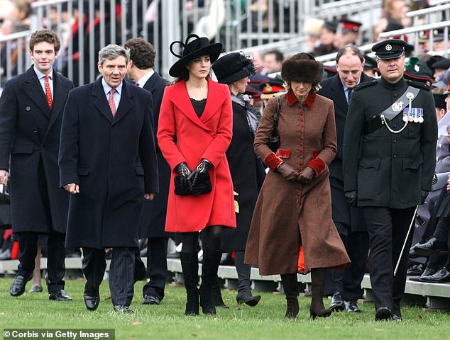 Kate walks between her mother and father at William's passing out parade at Sandringham in 2007.