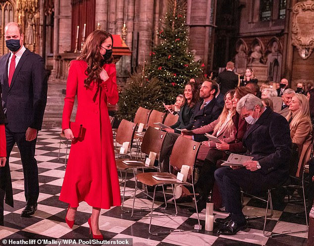 William and Kate walk past Carole and Michael Middleton and Kate's siblings, Pippa and James, at the carol service inside Westminster Abbey, 2021.