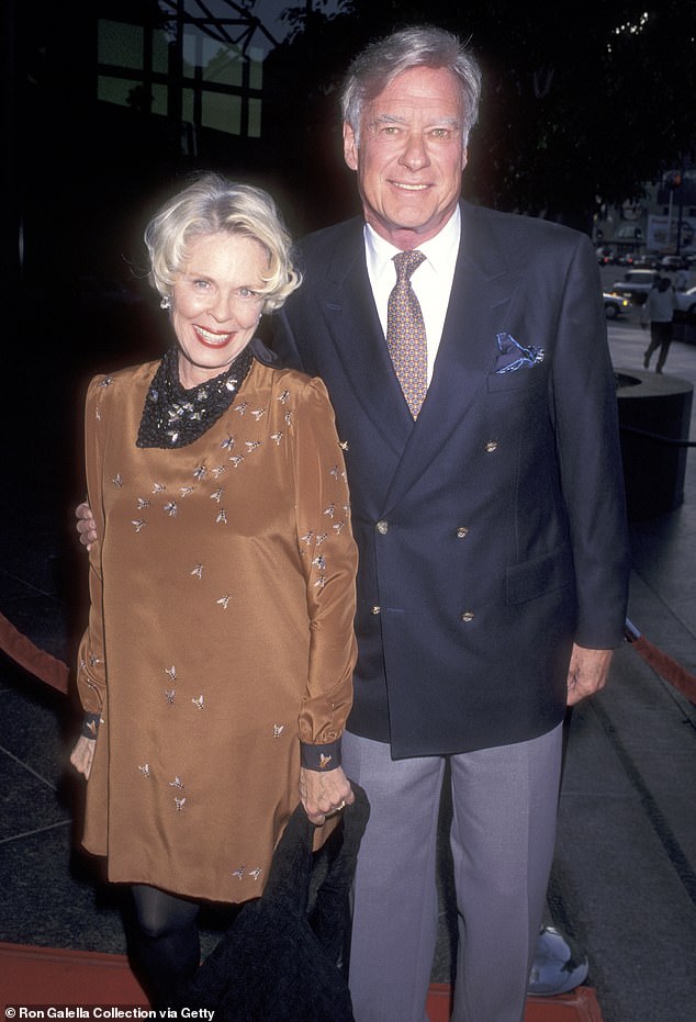 Evans was married to The Manchurian Candidate director John Frankenheimer; They appear in the photo in 1997.