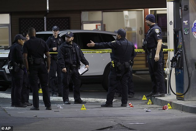 Oakland has been rocked by violent crime in recent months, including murders that increased from 78 in 2019 to 126 last year. (pictured) Police investigate multiple shooting and homicide at Oakland gas station in January 2023)