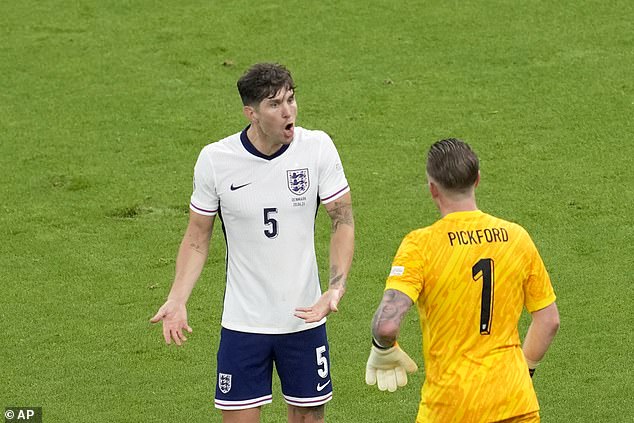 We also didn't see any of the ball-playing skills that John Stones (left) displays for Man City during the match.