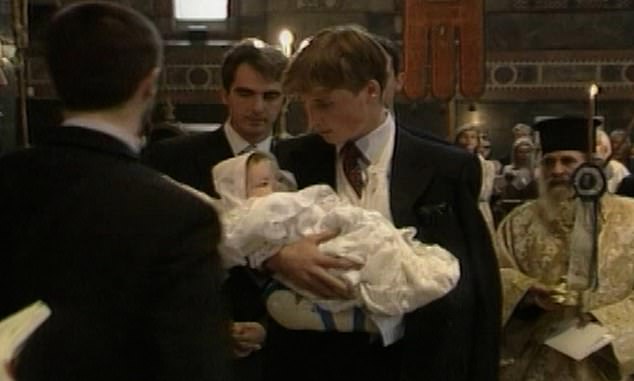 In a clip from 25 years ago, 17-year-old William is shown in his heartthrob days, with a full head of hair and a strong jaw. The video shows William holding the child as he became his godfather.