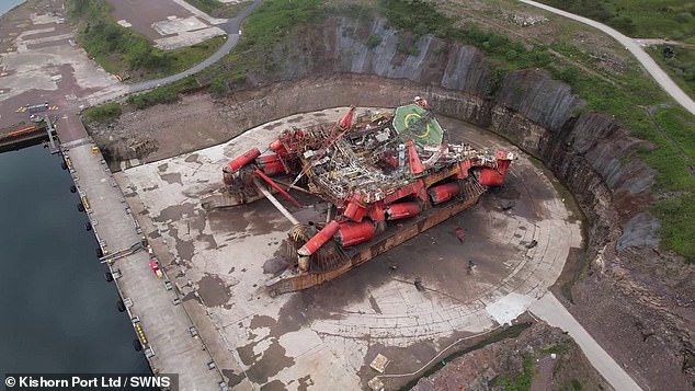 After years serving the North Sea oil industry, the platform is reduced to a pile of scrap metal.