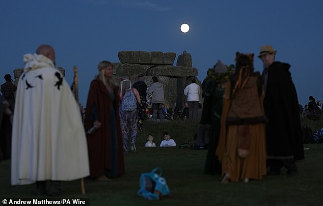 In a tradition dating back thousands of years, druids and pagans joined a colorful mix of sun worshipers.