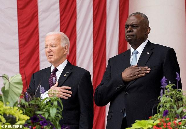 US Defense Secretary Lloyd Austin, pictured with President Joe Biden, has said the climate 