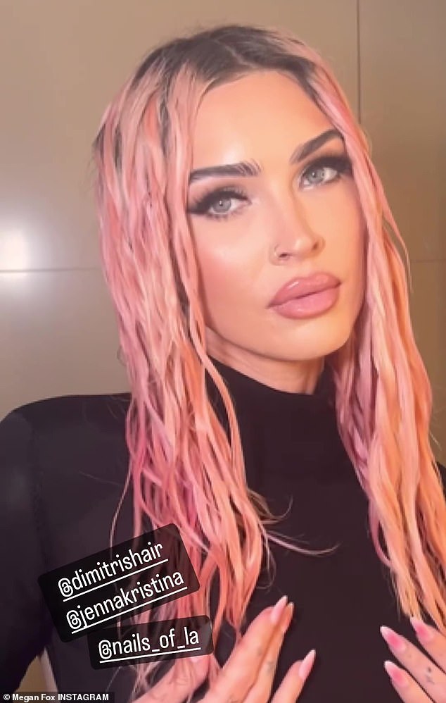 Model Megan Fox, 38 (pictured), debuted her bubblegum pink hair to her Instagram followers.