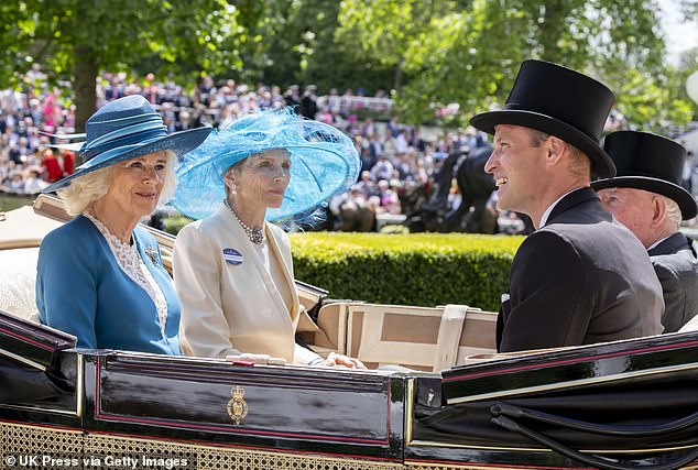 Queen Camilla looks at Prince William as she smiles at revelers at Royal Ascot today