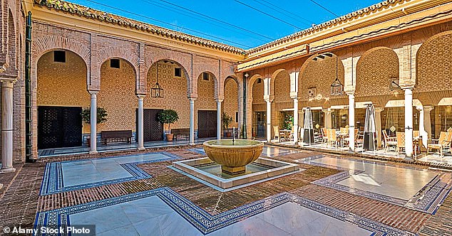 Elegant: Parador de Carmona features a fabulous Moorish-style tiled patio, upstairs