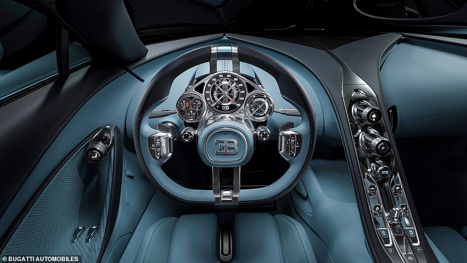 The fixed-hub steering wheel will rotate around the driver's panel, so Tourbillon drivers will have an unobstructed view of its instrumentation.