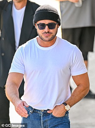 Zac cut an intimidating figure on Thursday with his bulging biceps and broad shoulders, a far cry from his younger self.