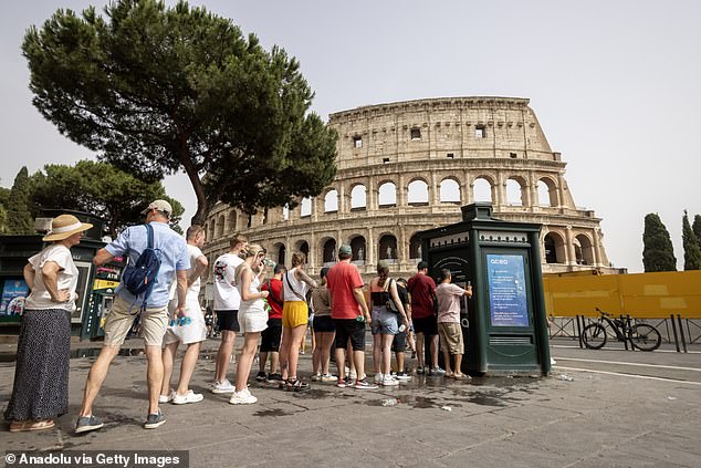 Rome was hit by a heatwave this week and tourists pictured queuing for water outside the Colosseum.