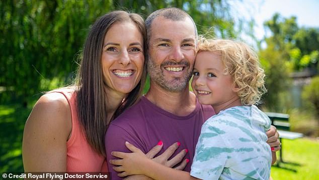 Parents Emma (left) and Ryan (center) Galloway are pictured with Parker, who is now 4 years old.