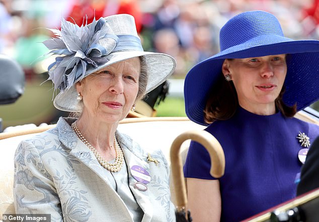 Sarah arrived on the third day of the annual races alongside Princess Anne (left), who wore an elegant silver-blue suit and a hat adorned with flowers in matching colours.