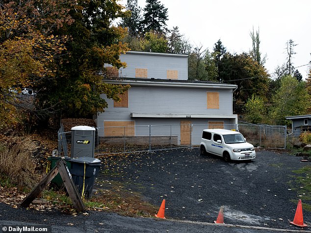 Mortensen told authorities she had seen a strange figure dressed in black walking past her toward the back exit of the house, pictured, shortly after 4 a.m. on the night of the murders.