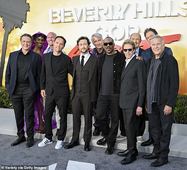 The cast joined some crew members for a group photo; Pictured are Judge Reinhold, Chantal Nchako, Will Beall, director Mark Molloy, Joseph Gordon-Levitt, Bronson Pinchot, Eddie Murphy, producer Jerry Bruckheimer, John Ashton, Kevin Bacon and Paul Reiser.