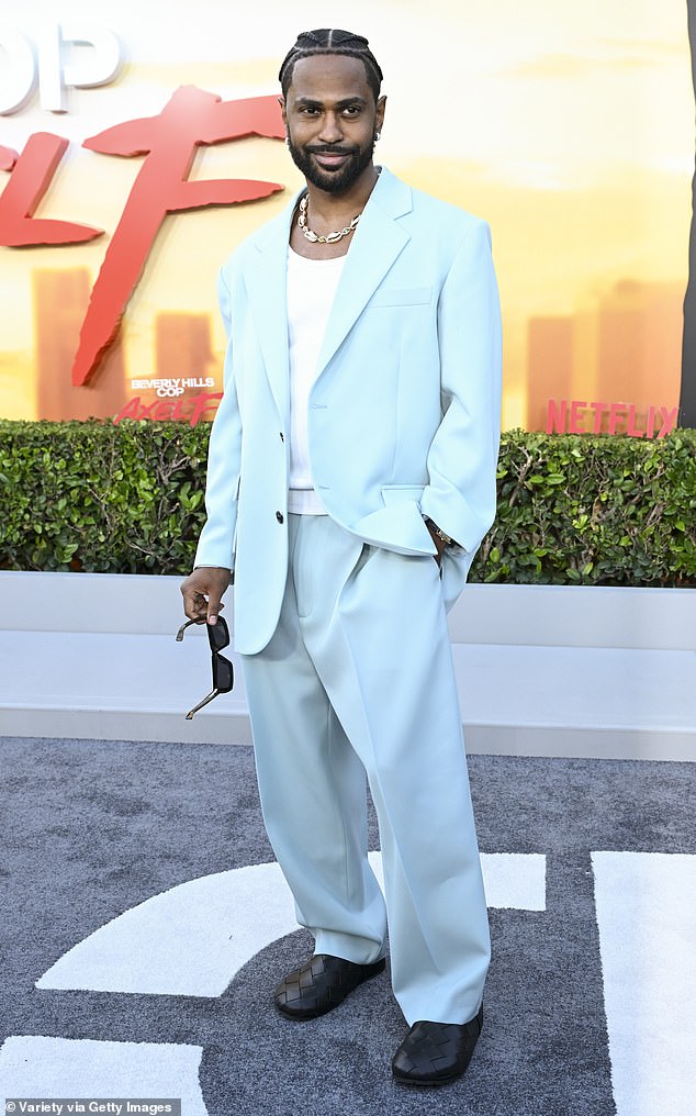 Rapper Big Sean (born Sean Michael Leonard Anderson), 36, got in on all the fun in a light blue suit, white T-shirt and black shoes.