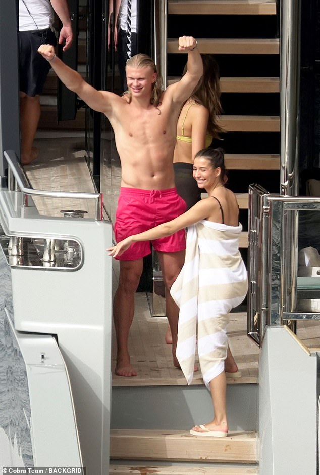 The brunette beauty was seen relaxing on her yacht with Erling, before heading to the famous Italian hotspot, the Blue Grotto.