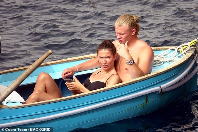 The couple boarded a small boat as they headed to the famous Italian hotspot.