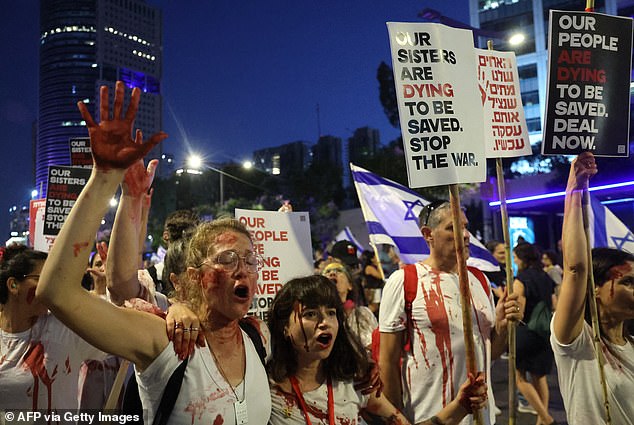 Relatives and supporters of Israelis taken hostage by Palestinian militants in Gaza in the October 7 attacks, demonstrate calling for their release in the central city of Tel Aviv on June 8, 2024.