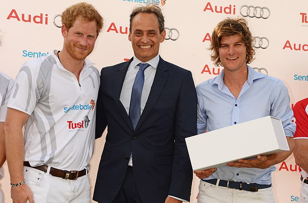 Prince Harry, Andre Konsbruck, head of Audi UK, and William Melville-Smith attend the first day of the Audi Polo Challenge at Coworth Park on May 28, 2016.