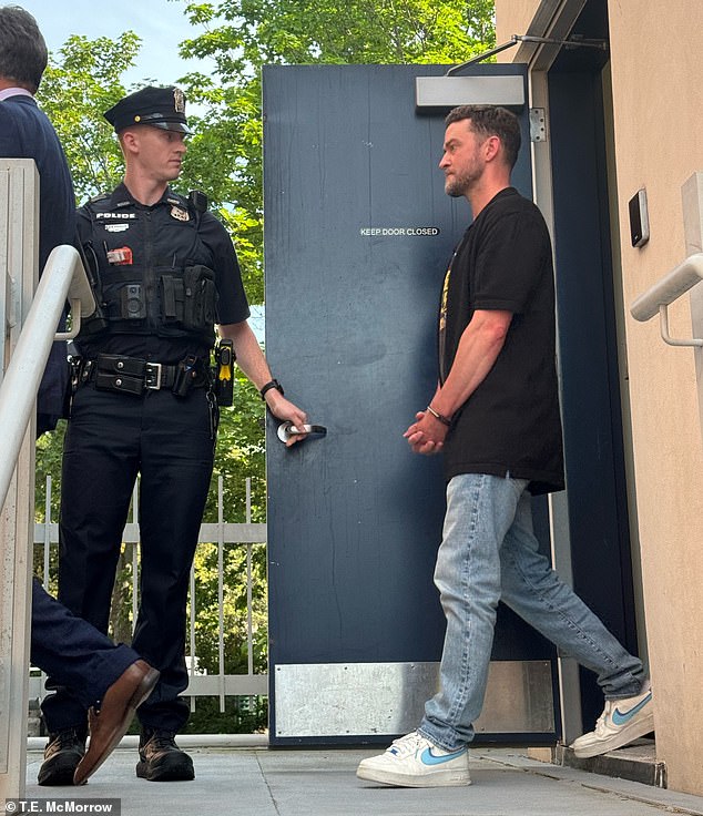 On Tuesday, news emerged that Justin (seen leaving the police station), 43, had been arrested for drunk driving in the exclusive Hamptons enclave of Sag Harbor.