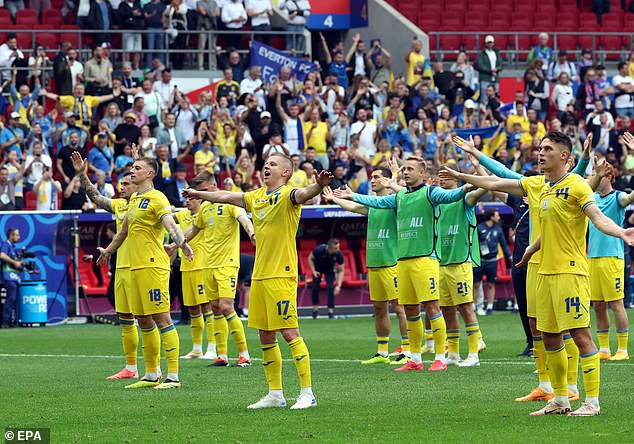 Ukraine's players hugged their fans as they celebrated the historic victory together.