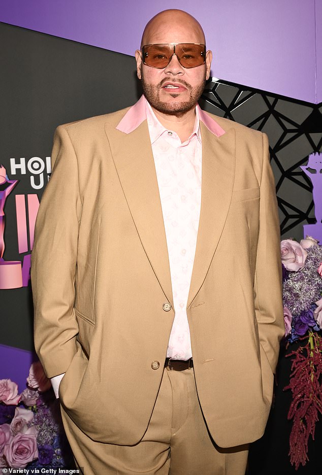 Fat Joe donned a tan suit with pink lapels and a white plaid shirt.