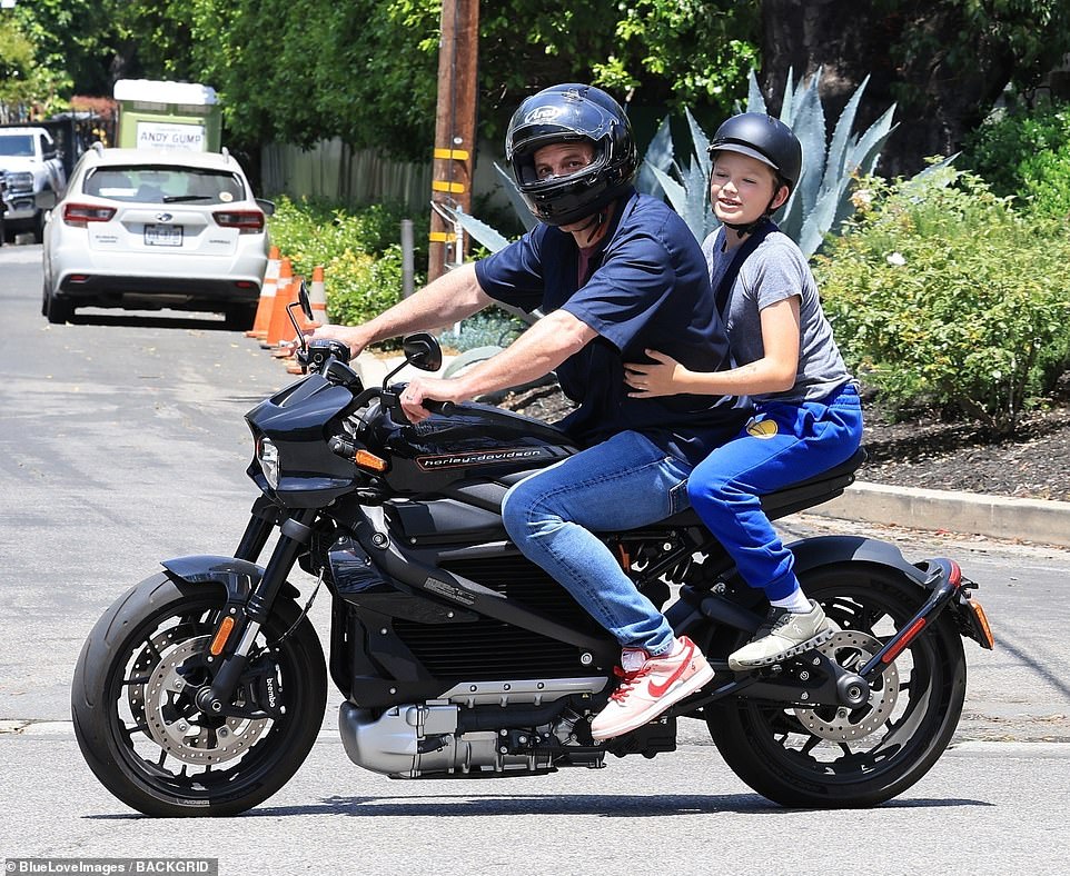 While his wife roamed around Italy, Affleck spent quality time with his son Samuel riding his motorcycle.