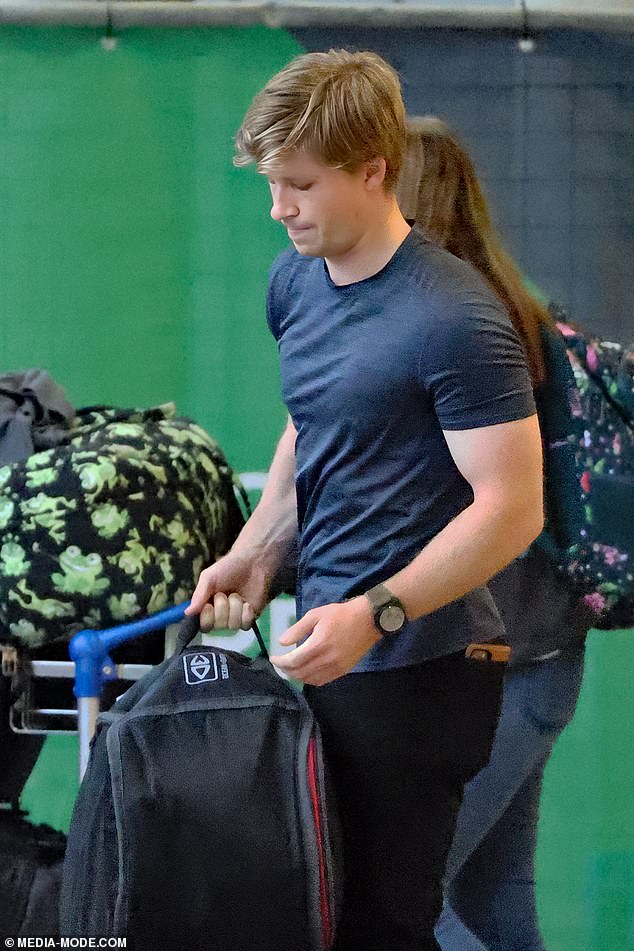 The conservationist, 20, was accompanied by his mother, Terri Irwin, when he landed at Brisbane airport.