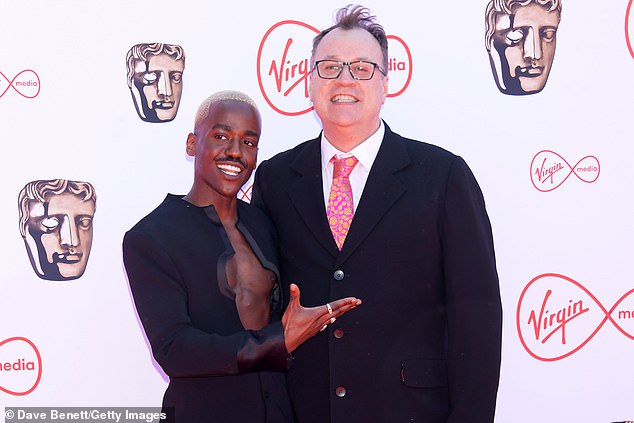 When the BBC and Disney+ deal was rumored to be worth $100 million, Russell T Davies assured fans that Doctor Who was still the same show (pictured right, in 2022, with Ncuti Gatwa, a the left).