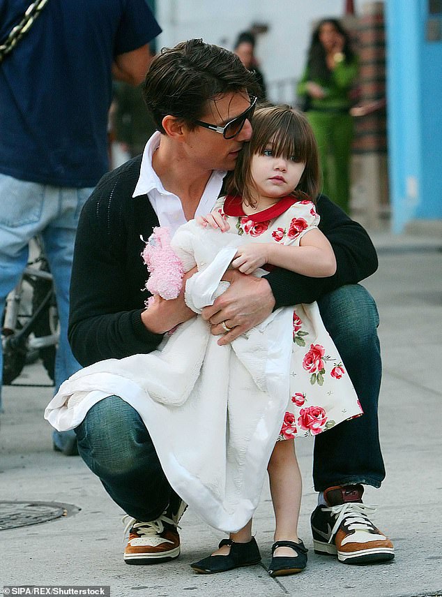 Tom Cruise was spotted attending Taylor Swift's Eras Tour in London while Suri graduated; (pictured in 2008)