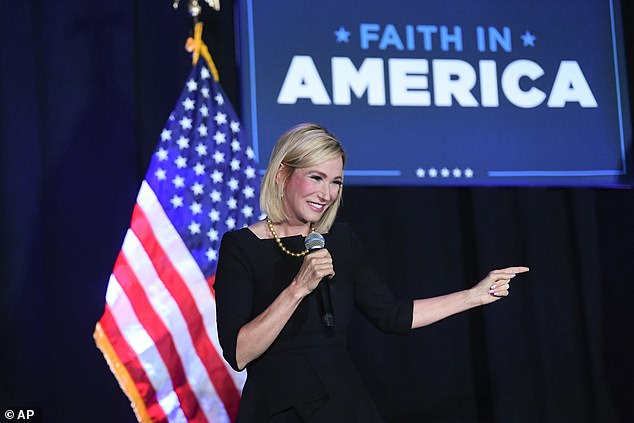 White speaks during a Donald Trump campaign event courting devout conservatives by combining praise, prayer and patriotism.