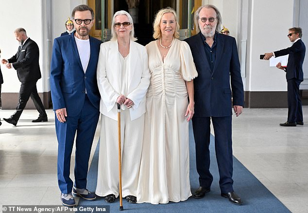 ABBA, Bjorn Ulvaeus, Anni-Frid Lyngstad, Agnetha Faltskog and Benny Andersson pose for a photo after receiving the Royal Vasa Order from the King and Queen of Sweden during a ceremony at the Royal Palace in Stockholm on May 31, 2024 .