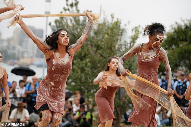 The native title did not include the resort on the island, which was managed by Contiki and was under a private lease held by Tower Holdings (pictured, a smoking ceremony taking place in Sydney)