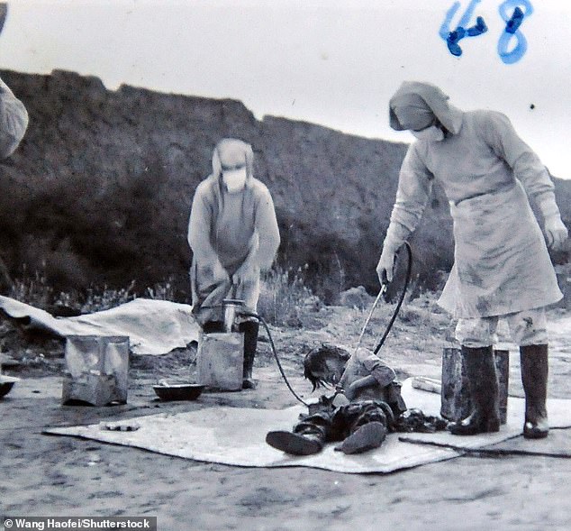 A human 'subject', apparently a young Chinese civilian, is subjected to an unknown form of bacteriological testing in Unit 731