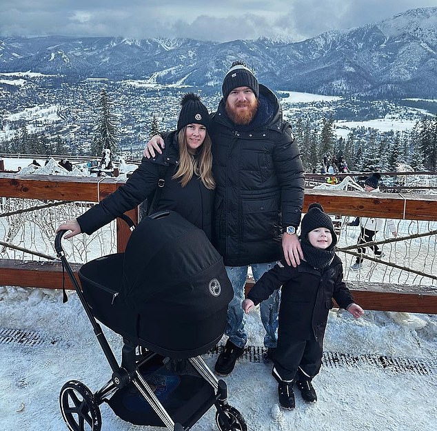 Adam is a family man and visited snowy Poland with his wife and son during the winter.