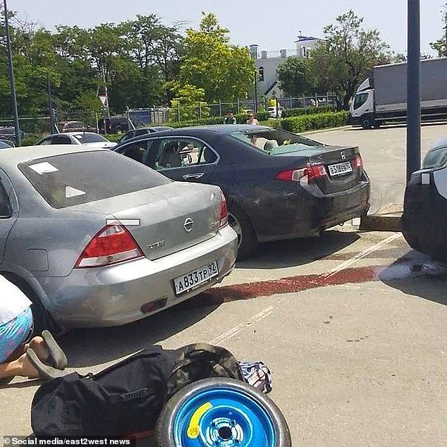 Cars parked next to Sevastopol beach were also hit by debris, breaking their windshields.