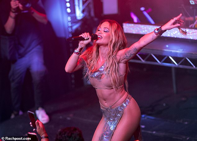 The British Award-nominated star was captured smiling as she belted out some of her best songs, as well as her new single Ask and You Shall Receive as she egged on the dedicated crowd.