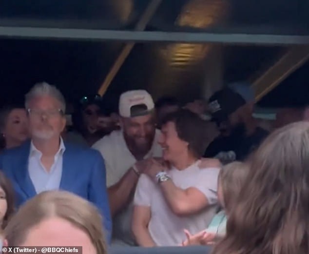 The Chiefs player was seen hugging the controversial actor in the VIP tent on Saturday night.