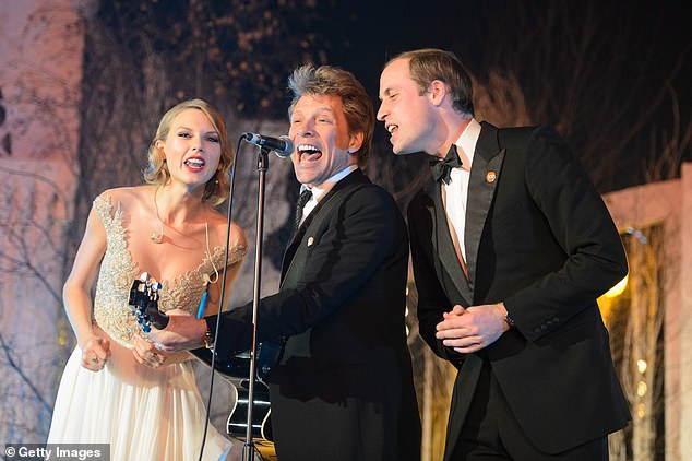 Taylor Swift, Jon Bon Jovi and Prince William are pictured singing Livin' On A Prayer on stage at the Centrepoint Gala Dinner at Kensington Palace in London on November 26, 2013, after the royals obeyed 