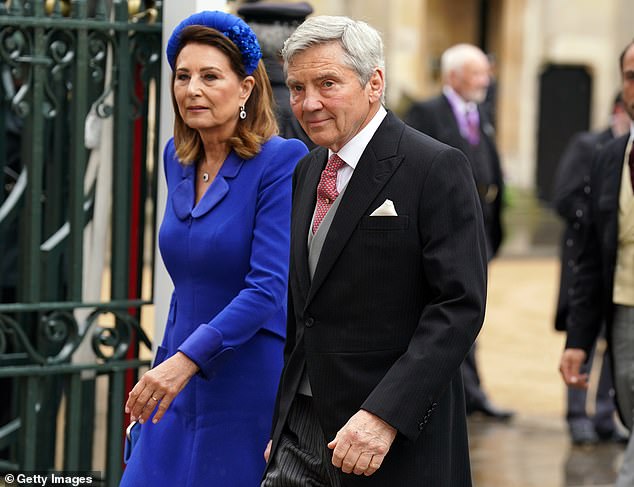 Carole and Michael Middleton at the King's Coronation last year. His support of William and Kate prompted the Prince to resume his royal duties.