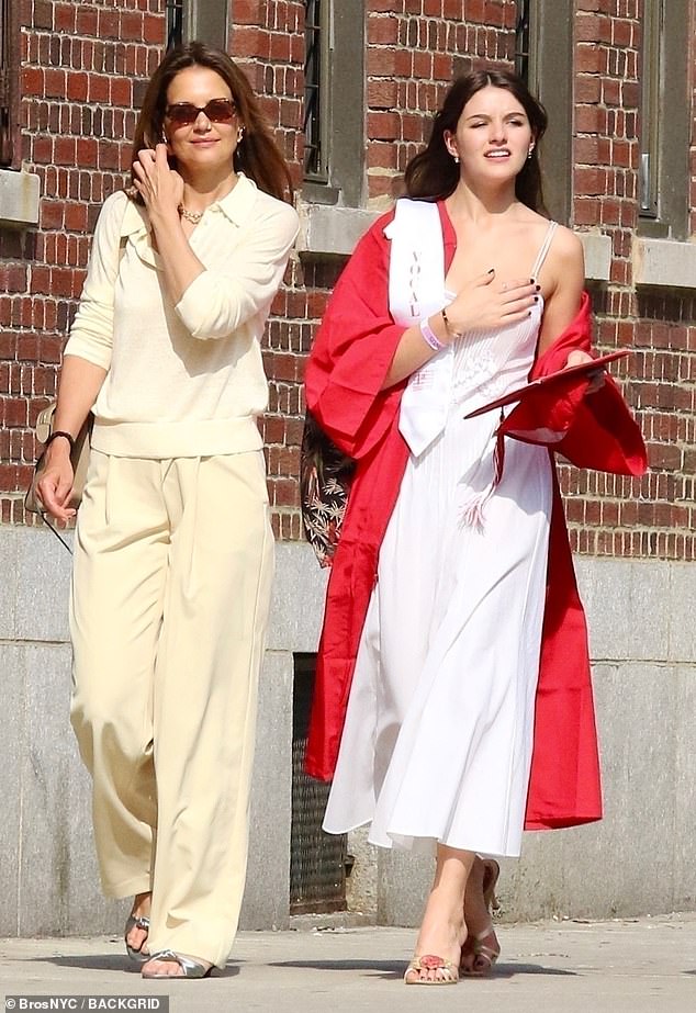 It comes after Katie's daughter Suri Cruise looked very happy after receiving her diploma from LaGuardia High School on Friday.