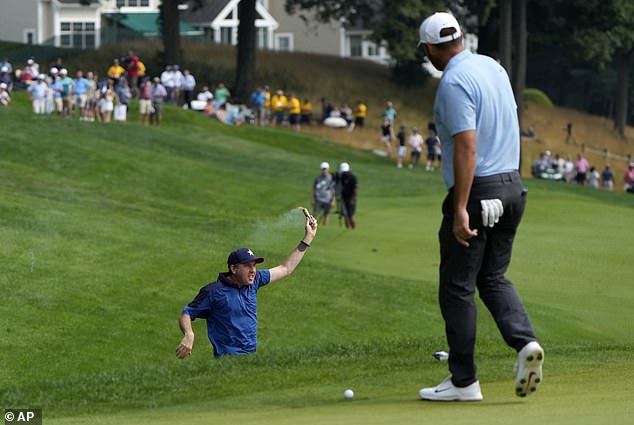 Climate change activists stormed the green just before a crucial putt by Scottie Scheffler.