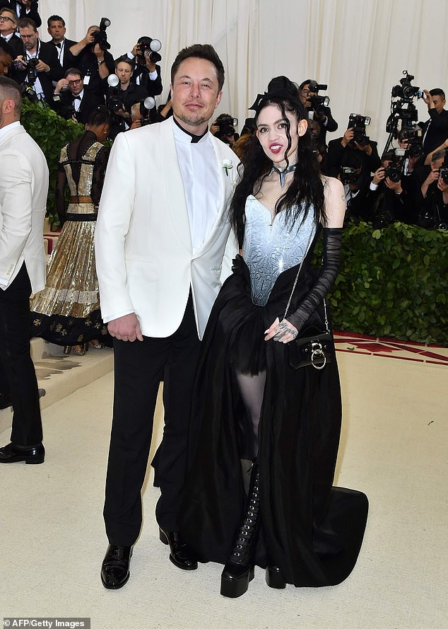 Aside from his three children with Zilis, he also shares three with Claire Boucher, known by her stage name Grimes. The couple appears in the photo in 2018.