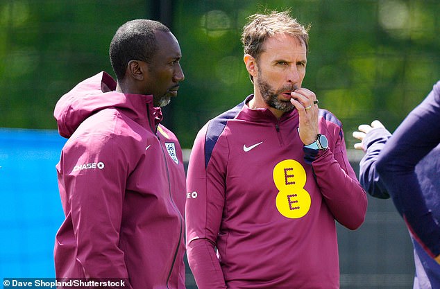 Despite Kane coming under fire for his performance against Denmark, Gareth Southgate (right) keeps faith in the England captain ahead of Tuesday's match against Slovenia.