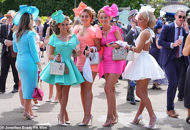 The stylish attendees put on a colorful spectacle as they arrived at the racecourse, wearing their most daring outfits as they made the most of the Berkshire sunshine.